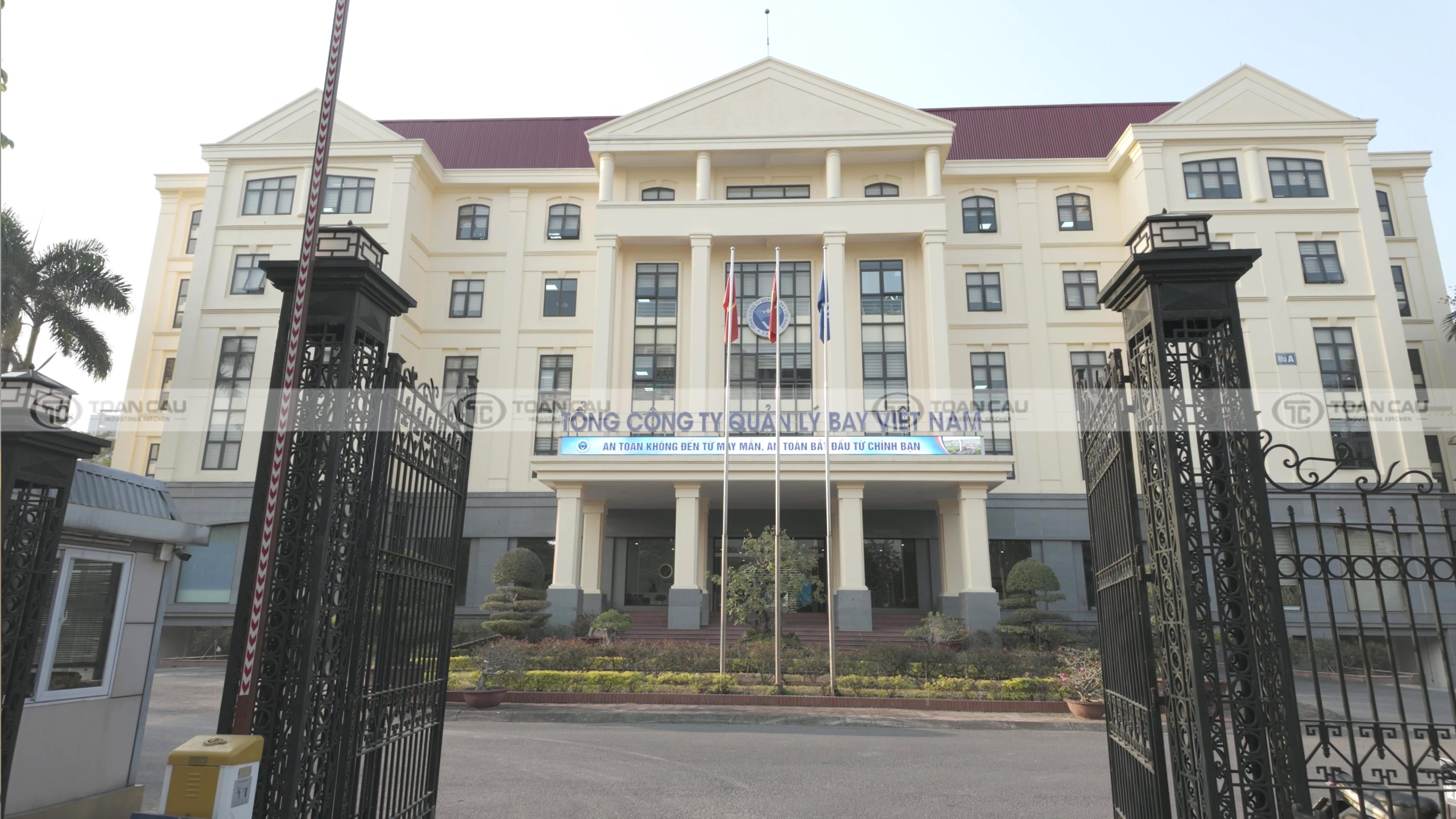 a building with flags in front of it